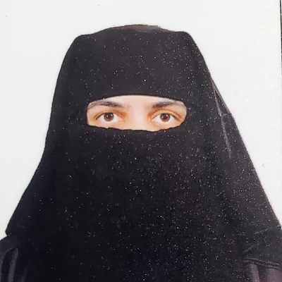 Dr. Amina